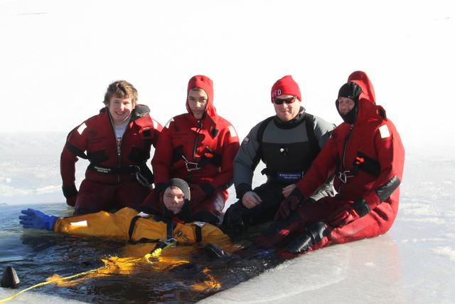 Left to Right FF. C. Lutz, FF B. Angstadt, 1st LT Rohrauer, FF. J. Combs in the water FF J. Cobb 
